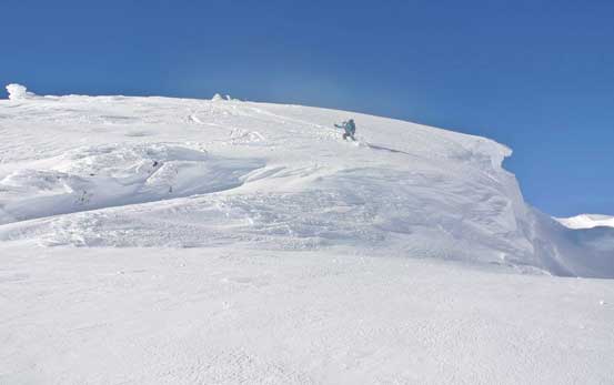 Me skiing down the summit block. Photo by Alex