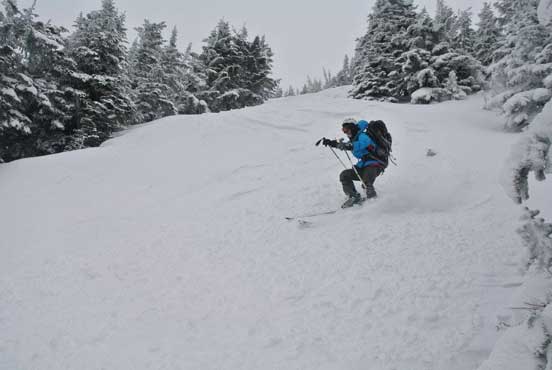 Me skiing down the mid-slope. Photo by Alex