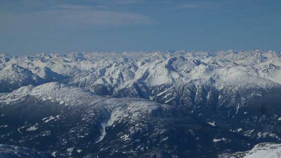 Looking over Ipsoot Mountain towards distant peaks by Lillooet Icefield