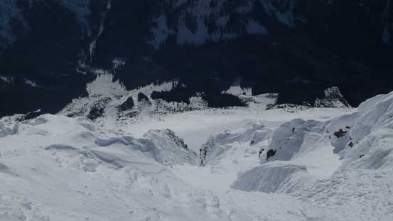 The steep south face drops one vertical mile into Wedge Pass