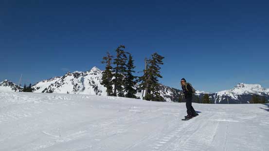 A snowboarder coming down