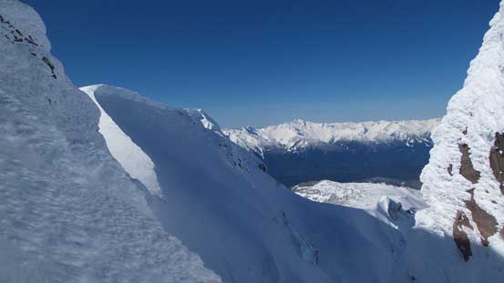 Cresting the summit ridge at a low col. 
