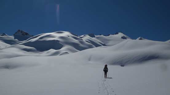 Alex plodding up the typical slope. Deception Peak right of center
