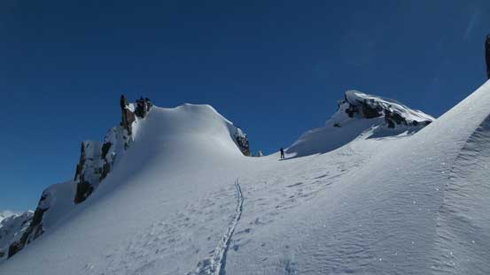 Alex arriving at the summit area. We climbed the one on left side