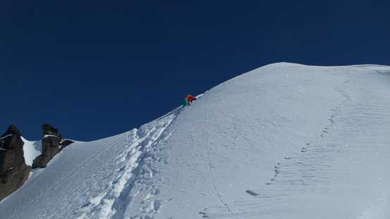 Down-climbing from the summit