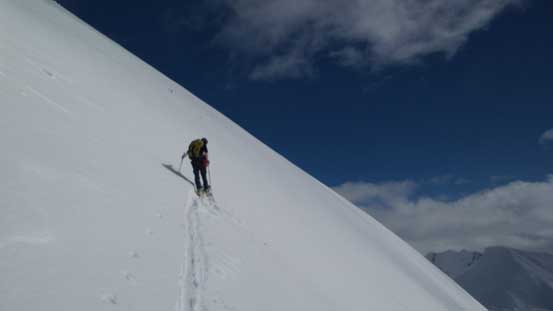 Alex skinning up the big slope.