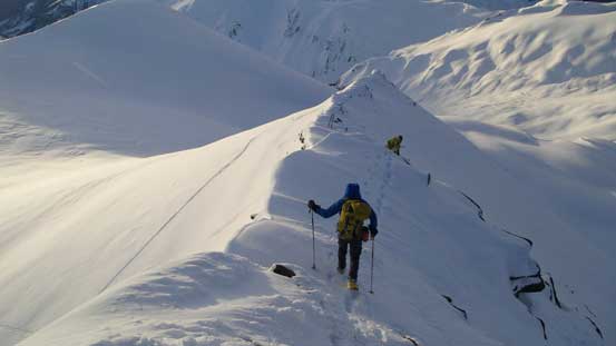 Alex returning along the summit ridge
