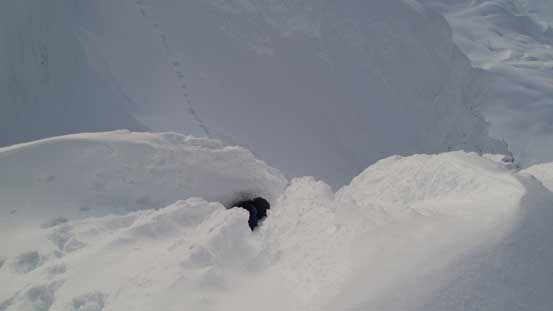 Alex stemming up through the rime ice channel - crux of the trip