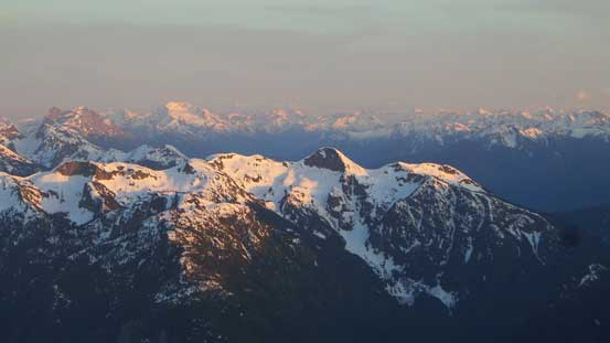 Looking over the summit of Marmot Mountain towards distant giants in the North Cascades