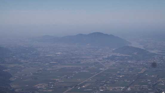 Looking down at Sumas Mountain and the city of Abbotsford. It was a bit hazy.