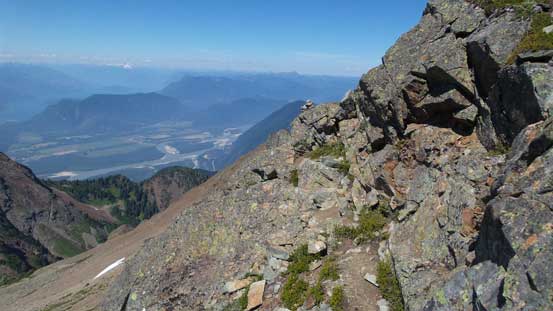 Traversing ledges beneath the ridge crest, to avoid some exposed stuffs