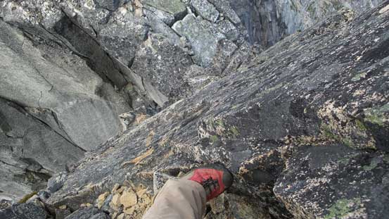 Climbing above the V-shaped chimney now, looking down