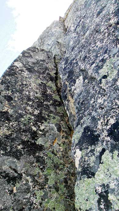 This is that crux crack - lieback and pulling up.