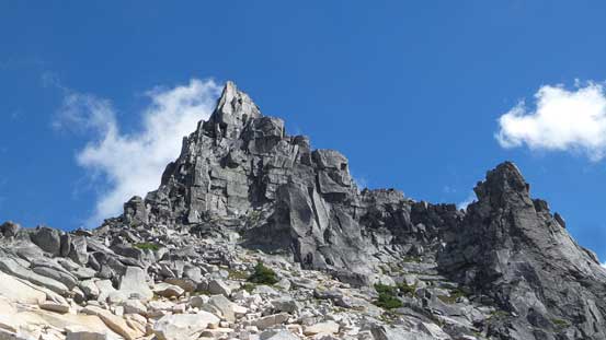 Looking back at the false summit. It appears more impressive in the afternoon