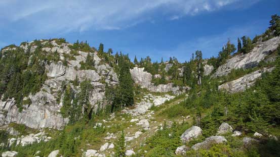 Ascending steeply towards a high shoulder