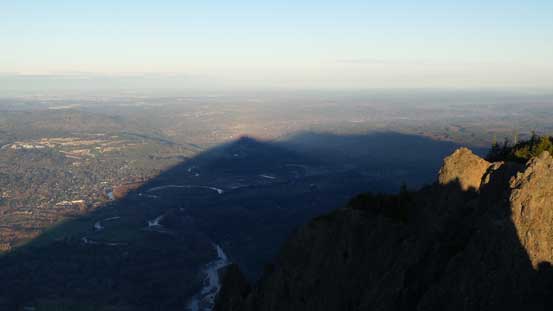 The shadow of Mt. Si casting on Snoqualmie River Valley