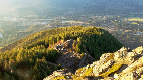 Looking down at the broad forested south rib where the trail ascends from