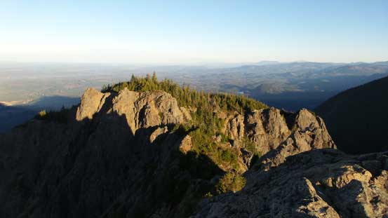 In the foreground is a lower sub-summit