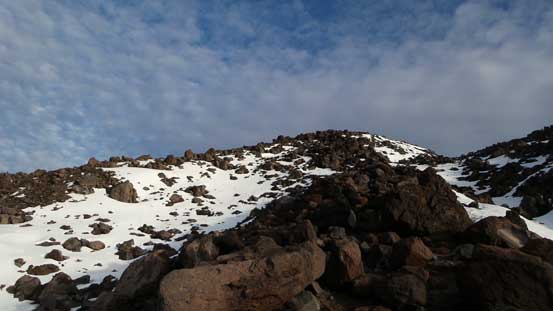 Ahead is that steeper roll of boulder field