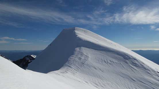 Looking back at the false summit (and that steeper icy roll)