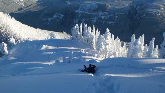 Vlad demonstrating the technique of glissading on soft powder
