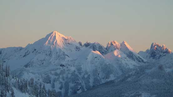 Alpenglow on Mt. Larabee, The Pleiades and Slesse Mountain