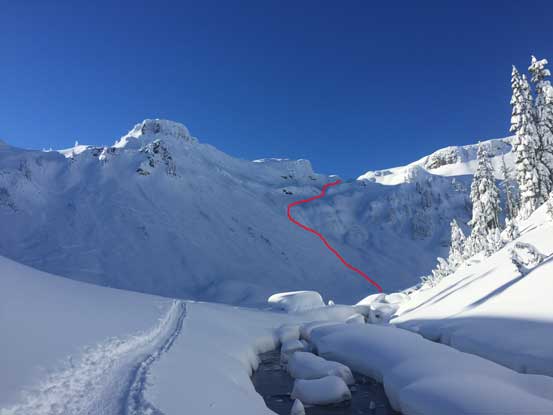 A review shot of the NE slopes with the lower route shown in red line