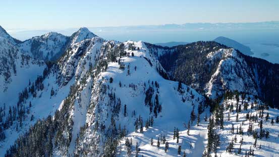 Looking down at Gotha Peak in the foreground with Hat Mountain behind