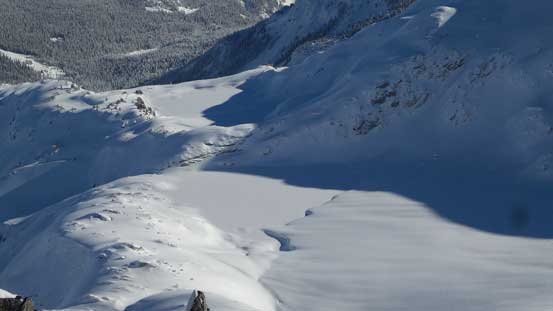 The frozen Saucer Lake at the toe of Spearhead Glacier