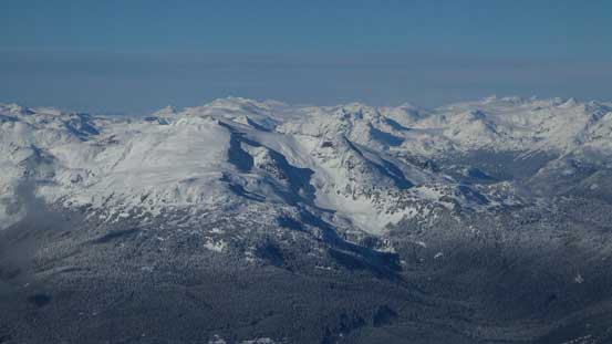 Looking over Rainbow Mountain towards the remote Elaho Mtn. and Manatee Range