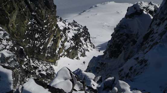 Skiers boot-packing up the "Stairmaster" on the SE Face