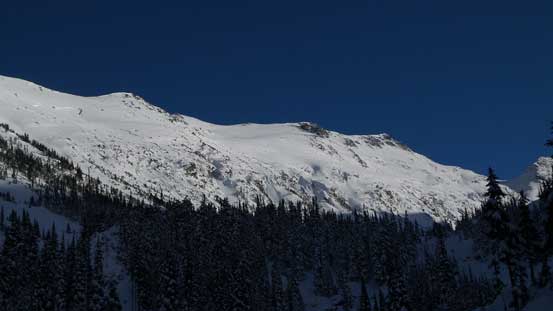Down to Blackcomb Creek now, looking back at our objective