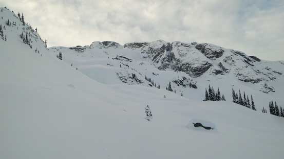 After a long haul up the steep forest here's me arriving at the traversing bench