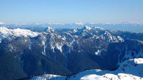 This is looking over the Mt. Seymour/Mt. Elsay group, towards distant peaks by Chilliwack area