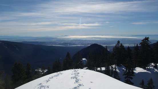 Looking back at the Lower Mainland. Lynn Peak is that dark triangular face. 