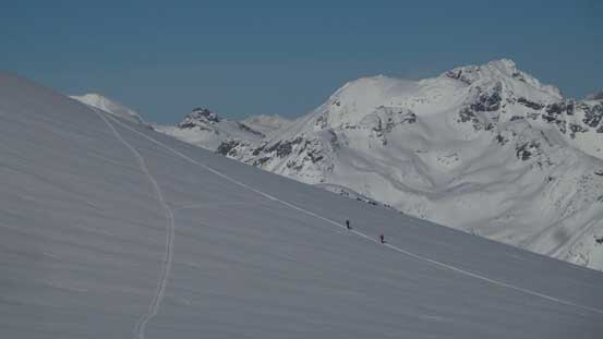 Two skiers on their way up Slalok Mountain. 