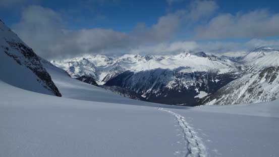 Plodding down the glacier following my own tracks