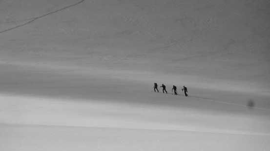 A group of 4 going for Slalok Mountain. They'd eventually ski its north face